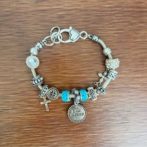 Ellen Tracy Silver and Turquoise Charm Bracelet.Size 8inch